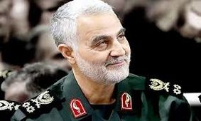 عکسی از حضور بانوی مسلمان ژاپنی بر سر مزار شهید سردار سلیمانی