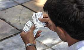 وظیفه وزارت کار توزیع بن و کوپن نیست
